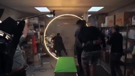 Benedict Cumberbatch moving through a portal at the hospital set in Doctor Strange