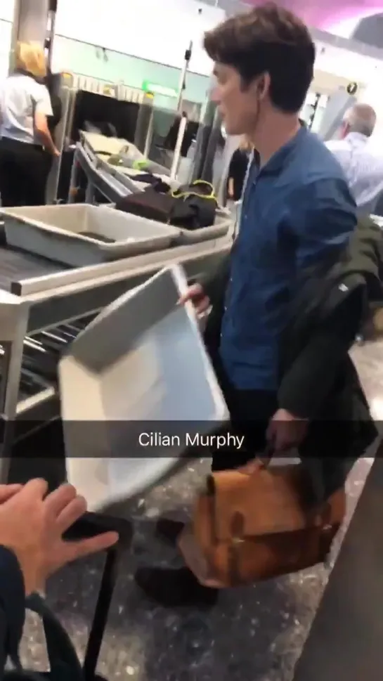 Cillian Murphy enjoying airport security just as much as the rest of us at