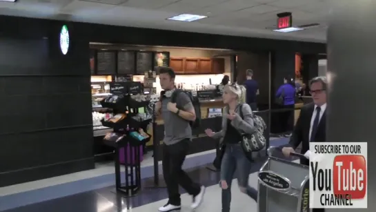 Nick Carter and Emily Kinney arriving at LAX Airport in Los Angeles