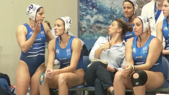 A gorgeous female waterpolo player Greek bench