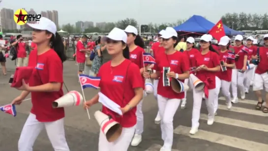 The North Korean cheer squad at last Sundays match between North and South Korea in Wuhan.