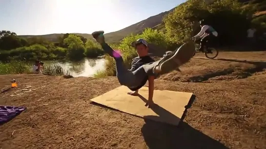 Huge Bike Jump into a Pond 35 feet in the air