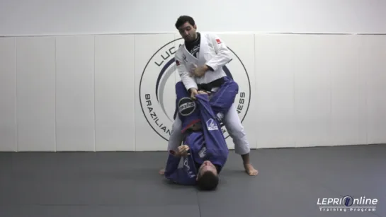 Standing Closed Guard Pass Using a Palm-Down Lapel Grip