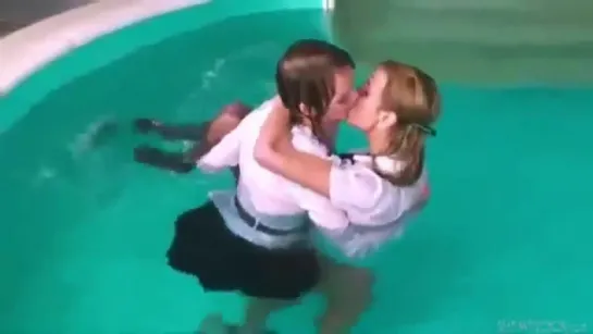 Two Girl having fun in the Pool.