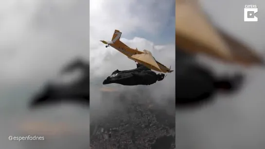 Daredevil Flies Alongside Plane