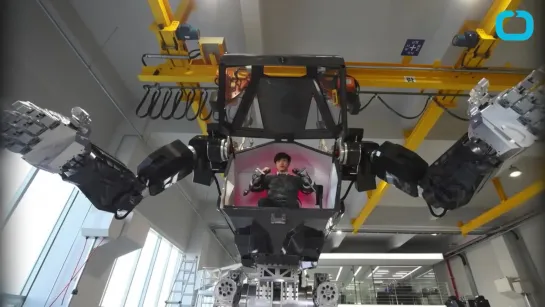 One Giant Step For Robot Suit With Man Inside