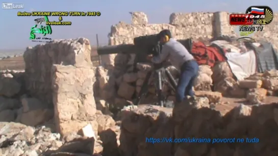 A Syrian patriot gets a hit on an exposed assad crime dynasty tank, with a TOW ATGM