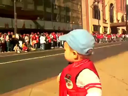 Toddler Leads the Celebration