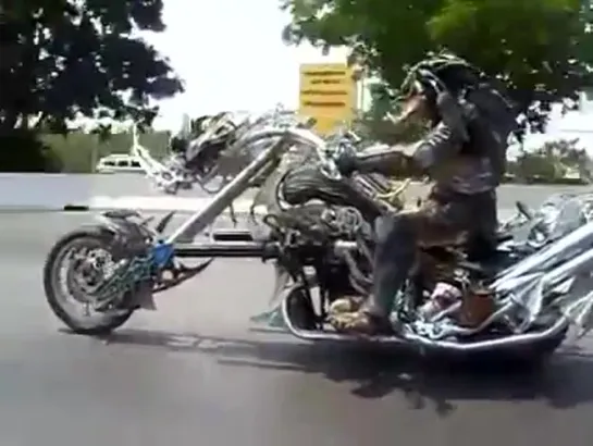 This is no joke! Predator ride a motorcycle