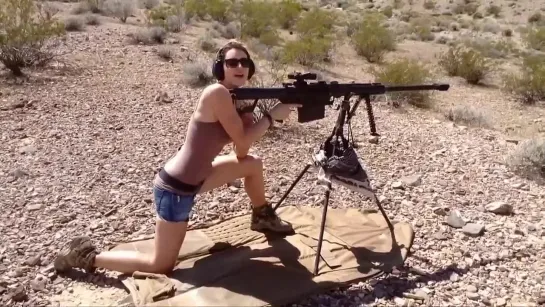 Girl shoots Barrett 50 BMG