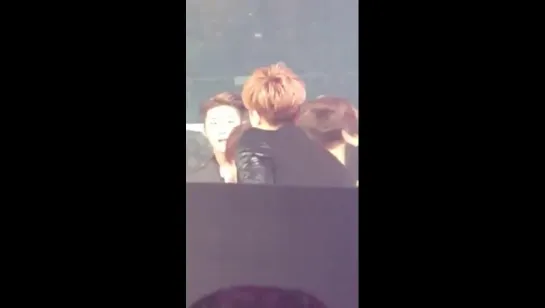 staff member telling ikon to get on stage and the surprised look on their faces