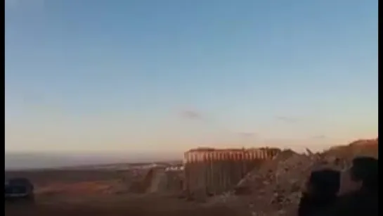 Rebels running away from a Russian warplanes