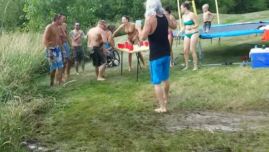 100 foot long Slip & Slide game of Flip Cup