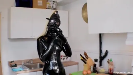 Latex catsuit gas mask