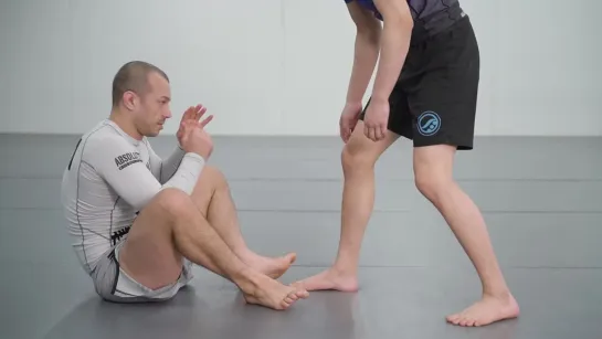 2-1 When your opponent leads with their legs you can attach to the leg with your upper body to set your De La Riva hook