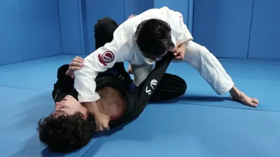 Fake cross choke to armbar