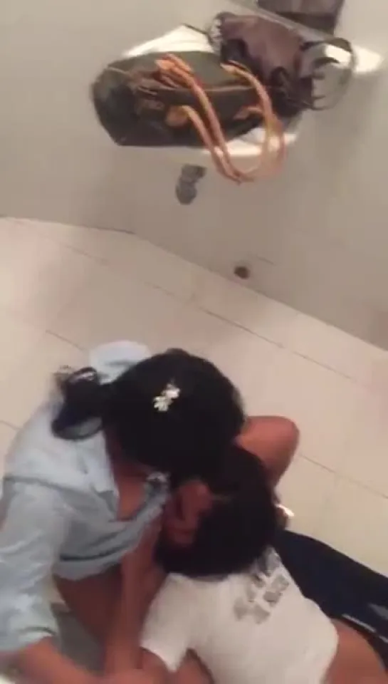 Wild bitch lick pussy in the WC