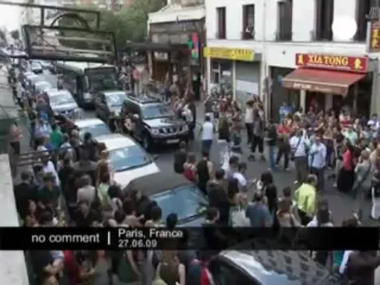 "Mass moonwalk" in memory of Michael Jackson in Paris, France