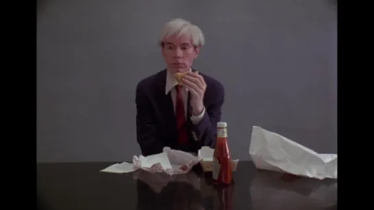 Andy Warhol Eating a Hamburger [1982]