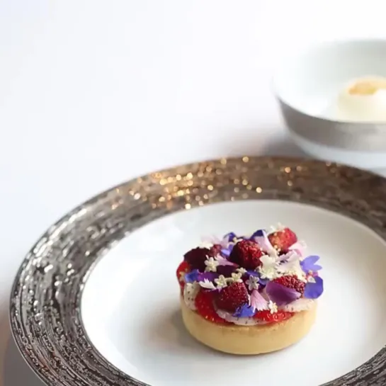 Almost too pretty to eat ! Strawberry tart with wild flower honey and crème fraîche sorbet at @petrusrestaurant