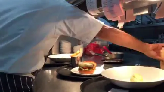 A glimpse of lunch service on the pass at the brand new @gordonramsayplanefood - that's one good-looking burger !