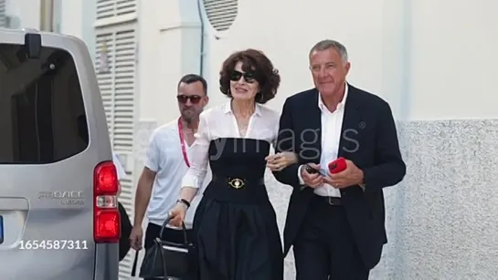 Fanny Ardant and Luca Barbareschi pose for photos they arrive for the photocall of "The Palace" at the VFF 2023