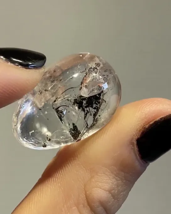 Ancient Water and Carbon Trapped Inside a Polished Quartz Crystal.