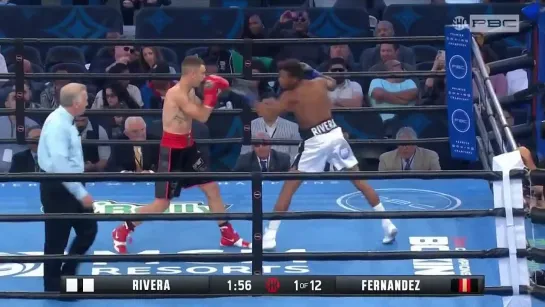 Michel Rivera - Jon Fernandez: Rivera goes on the attack early and lands a hard right!