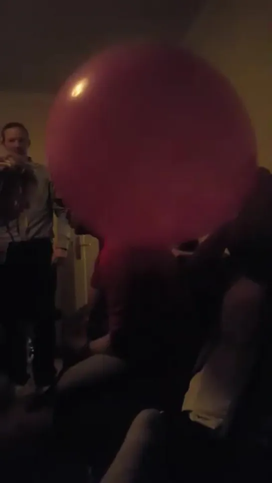 Girl blow up balloon on private party