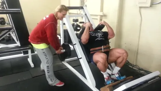 Tom Platz coaching me on hack squats with isotension