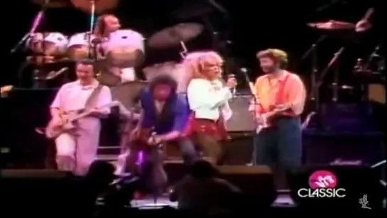 Eric Clapton, Tina Turner, Phil Collins, Dire Straits "Tearing Us Apart" (1985)