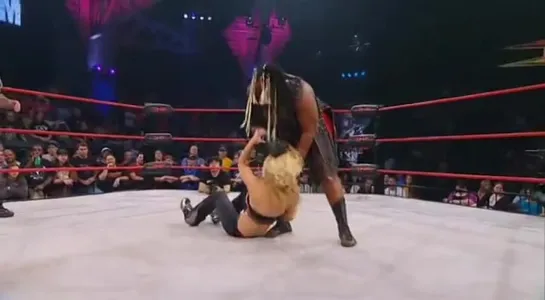 Awesome Kong(w/Raisha Saeed) vs Madison Rayne(w/Angelina Love & Velvet Sky)