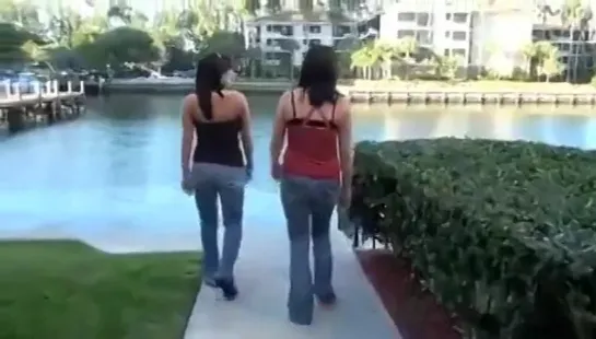 Two girls wet their jeans