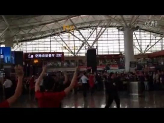 14.05.01 airport staff dance Rain La Song @ Xi'an Airport in China