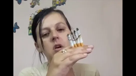 Chain smoking entire pack of cigarettes - gold clips.mp4