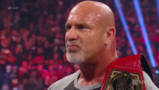 Brock Lesnar attacks New Universal Champion Goldberg.