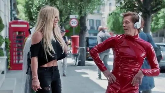 Kevin Bacon & Britney Spears in a commercial for Apple Music