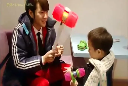 JKS playing with kid