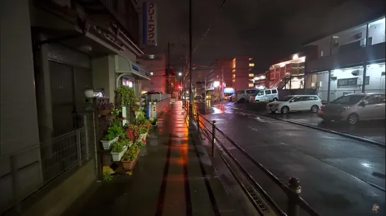 Rainy backstreets of Japan at night.