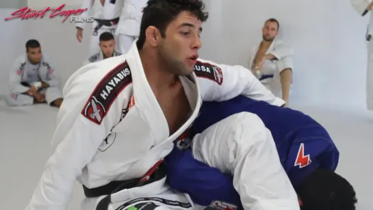 Marcus Buchecha and Braulio Estima teach Armbar to Omoplata from Half Guard