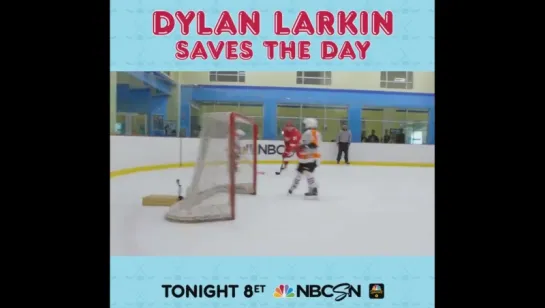 Dylan Larkin plays with children