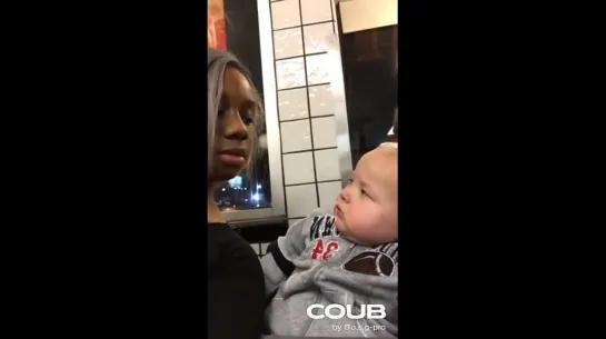 Baby Stares At Woman Then Smirks