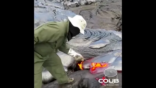 This is how geologists collect lava samples from an active volcano.