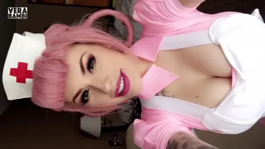 Медсестра позирует на камеру, показывая сиськи и зад #music #cosplay #nurse #pinkhair #Pokemon #miniskirt #boobs