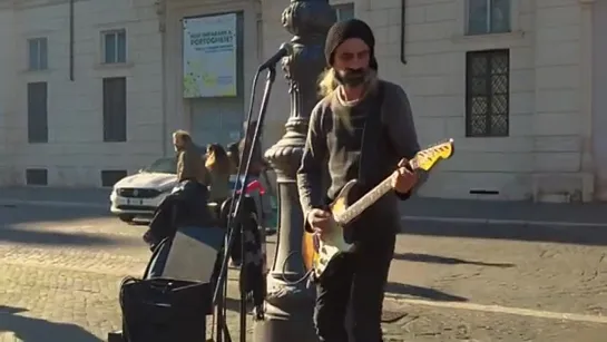 Fantastic street music in Rome, Italy! A guitar player street musician playing cool music