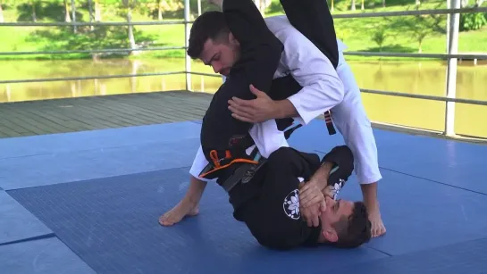 Caio Terra - ARMLOCK WHEN PULLING CLOSED GUARD AND OPPONENT INSISTS ON HOLDING THE GI