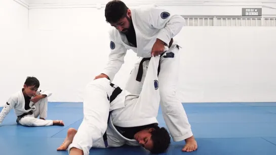 Arthur Mariath teaches Arm Bar From Stack Pass during the kids class on June 16, 2023