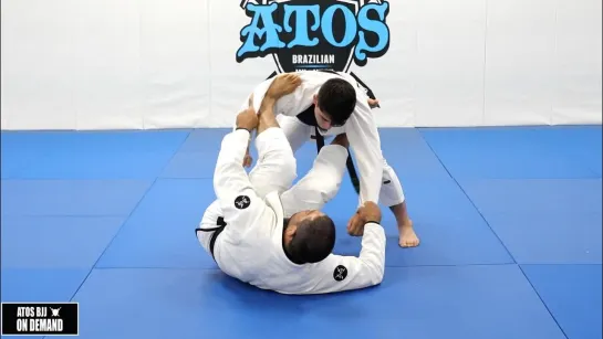 Andre Galvao - Modified Spider Guard Using the Lapel - Guard Retention  Subimission