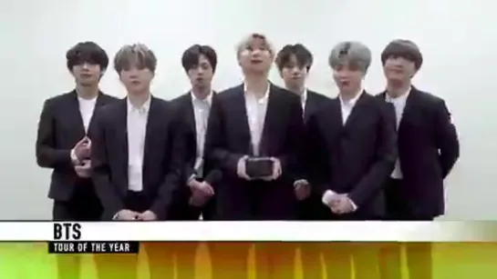 @BTS_twt accepts the award for Tour of the Year at the AMAs