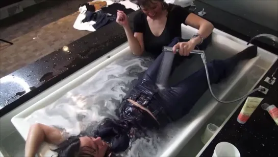 GIRLFRIENDS IN BATHTUB COMPLETELY CLOTHED